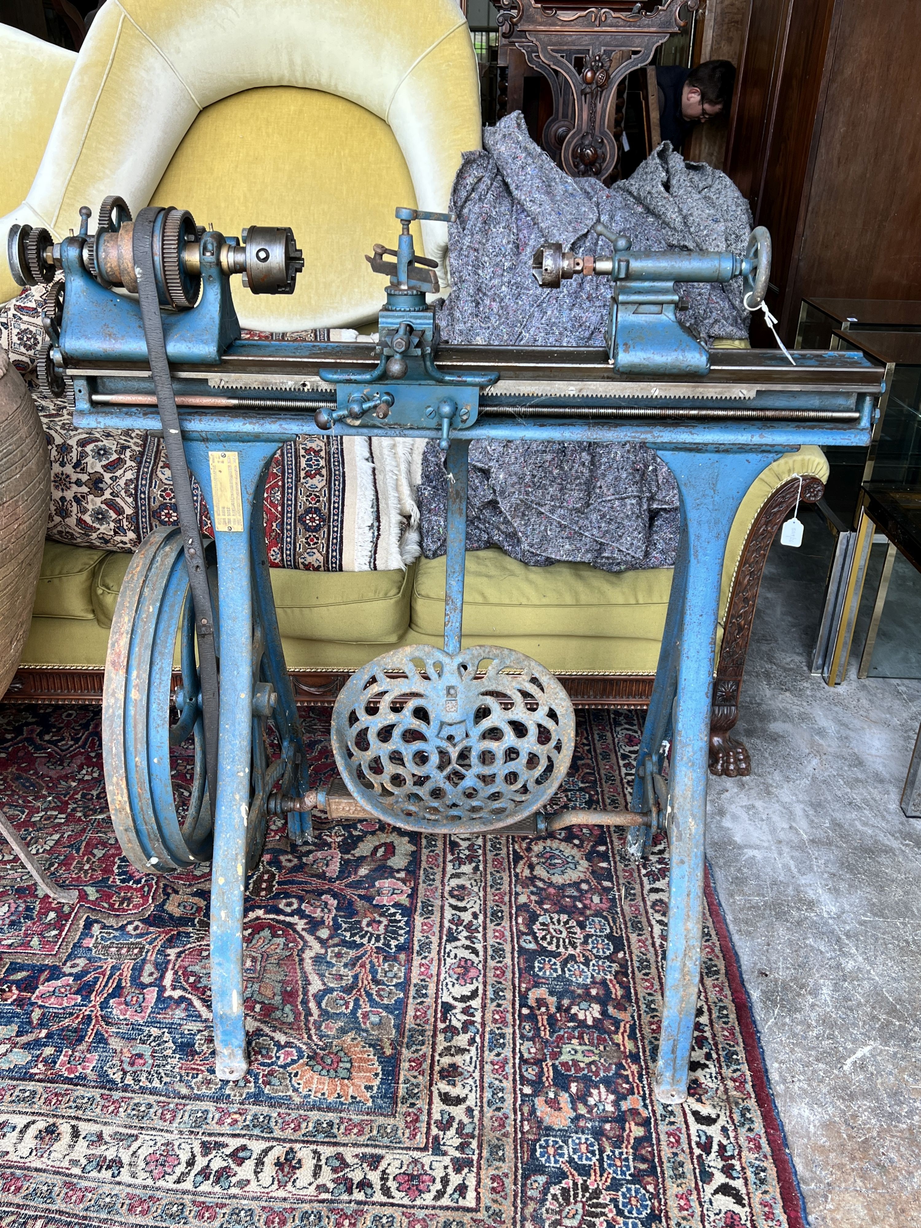 A Myford metalworkers lathe, with a three jaw chuck, width 108cm, height 116cm